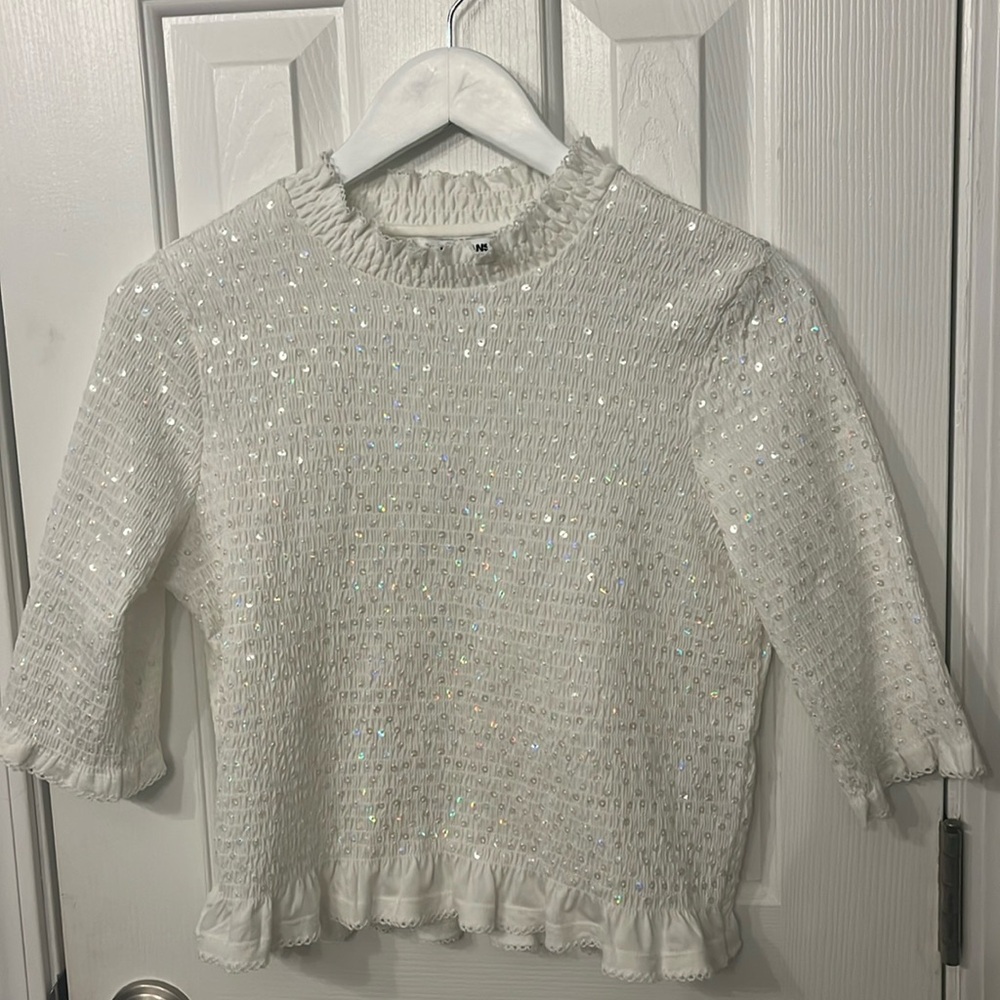 White ruffle sequin top